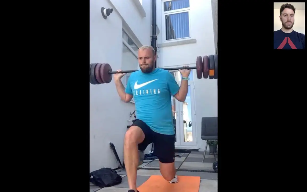 Barbell front lunge doing 1-2-1 live online session in Fforestfach with local personal trainer