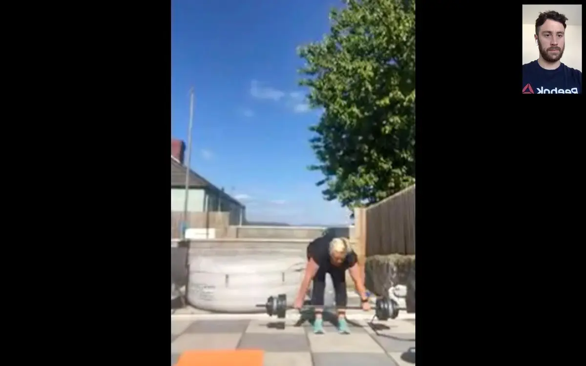 Lady in Manselton doing Bent over rows with Personal trainer in Swansea