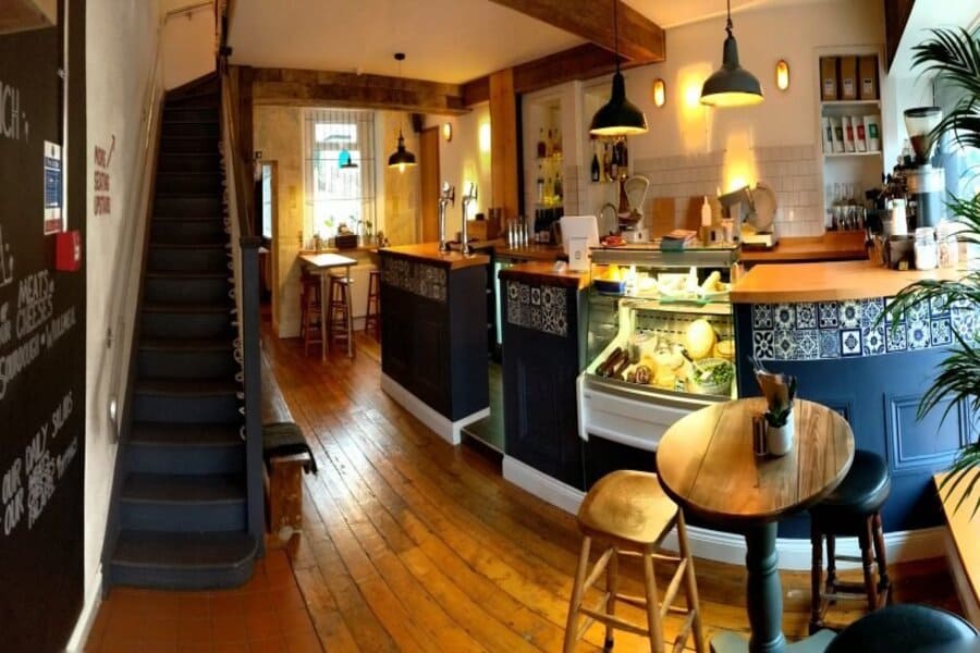 Bar and Counter with wooden floors and stairs